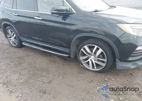 2016 Honda Pilot Touring z USA, uszkodzony, nr VIN 5FNYF6H91GB015643